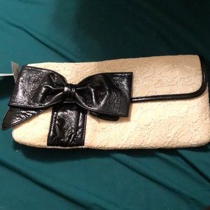 Ivory and blk clutch